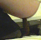 2 unsuspecting women are recorded pissing and taking a shit into a floor toilet as seen from underneath a restroom stall door. About 5 minutes.